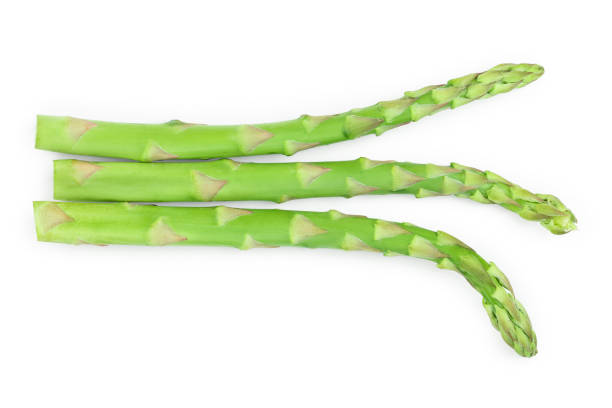 istock Fresh sprouts of asparagus isolated on white background. Top view. Flat lay 1162530773