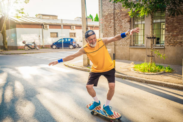 senior man enjoying retirement active senior having fun with his retirement young at heart stock pictures, royalty-free photos & images