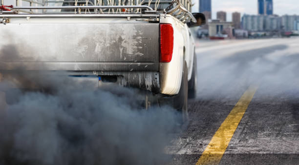 air pollution crisis in city from diesel vehicle exhaust pipe on road air pollution crisis in city from diesel vehicle exhaust pipe on road exhaust pipe photos stock pictures, royalty-free photos & images