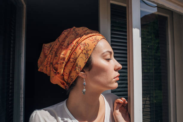 istock Stunning woman by the window 1162537010