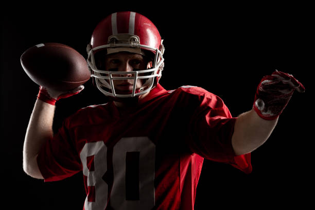 istock American football player throwing rugby ball 1162540316