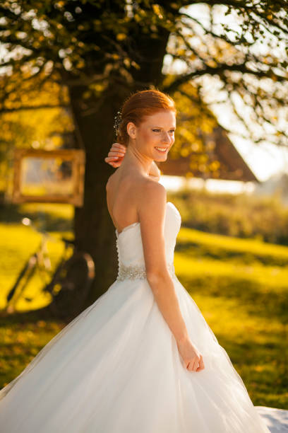 istock Young woman in wedding dress 1162541875