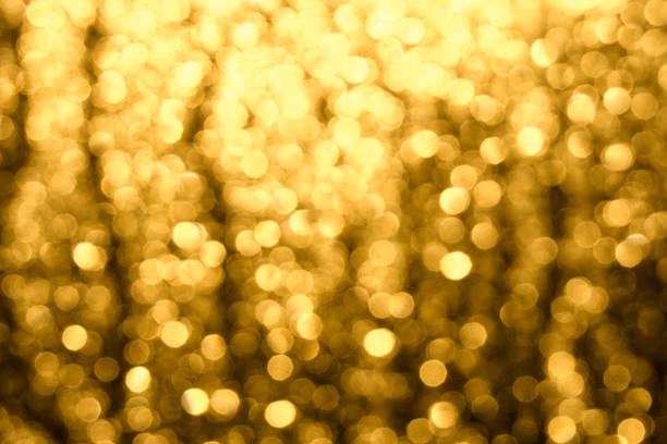 istock Golden-brown background with abstract blurred highlights. Bokeh in blur. 1162541933