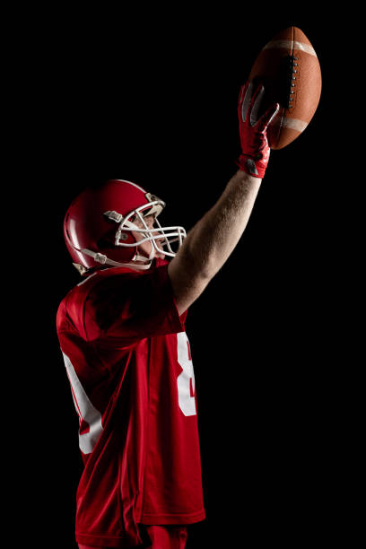 istock American football player cheering with arm up 1162542657