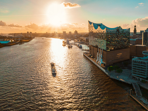 aerial view from waterside on Hamburg Hafen City at golden hour