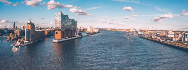 wide panoramic view on Hamburg Hafen City Wide panoramic drone view over the river on Hamburg Hafen city elbe river stock pictures, royalty-free photos & images
