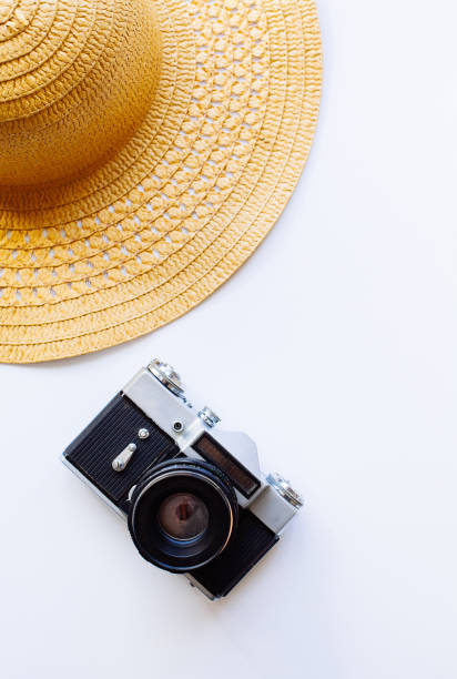 istock Flat lay design of travel concept with camera, hat, shells 1162546967