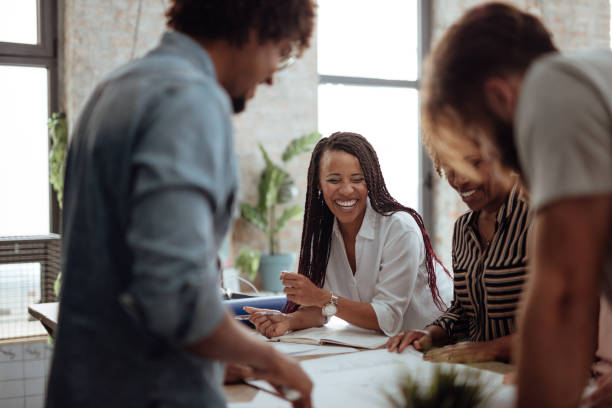 istock Team of architects working on a new business projects 1162547130