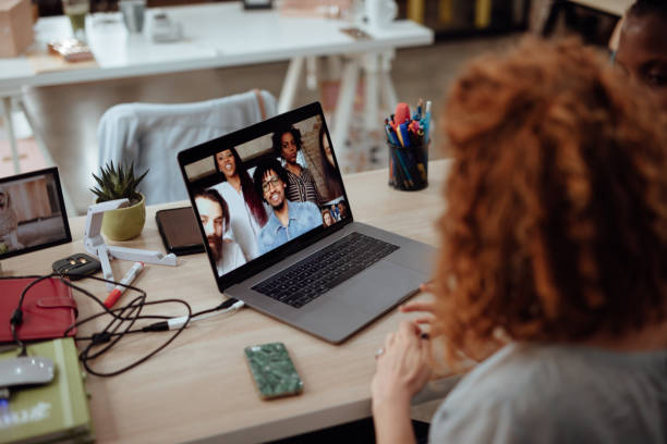 istock Group of people having video conference meeting at creative office 1162547133