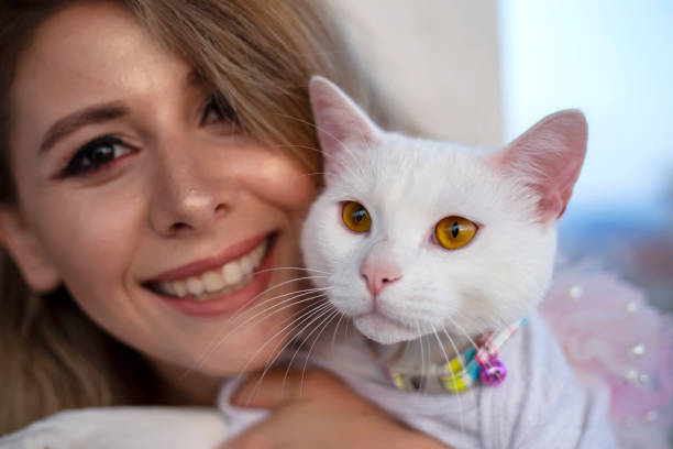 istock Mom and white cat are so beauty. 1162547686