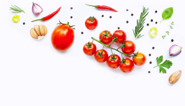 istock Various fresh vegetables and herbs on white background. Healthy eating concept 1162549109