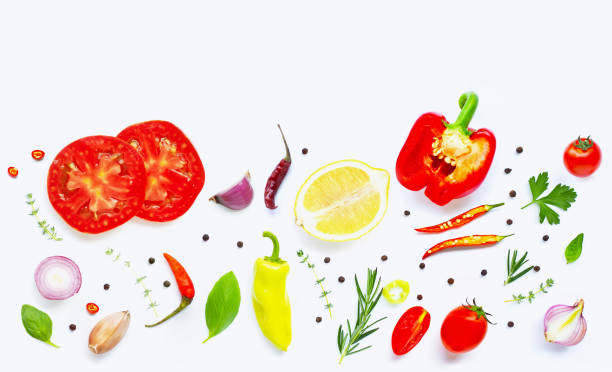 istock Various fresh vegetables and herbs on over white background. Healthy eating concept 1162549540
