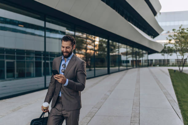 istock Businessman Using Smartphone Outdoor 1162553087