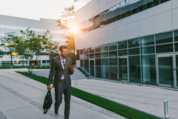 istock Businessman Using Smartphone Outdoor 1162553101