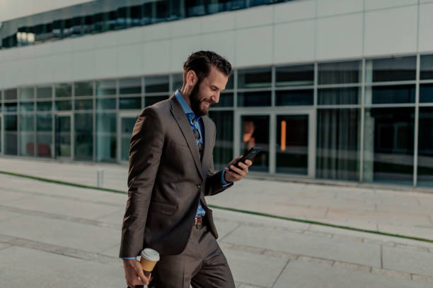 istock Businessman Using Smartphone Outdoor 1162553202