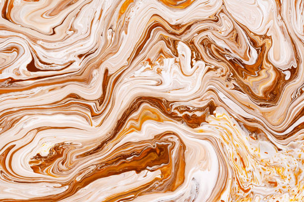 istock Caramel, cream dynamic and fluid raster texture. Abstract acrylic paints mixture color background. 1162554678