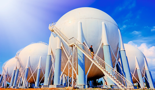 Summer view of big chemical plant. Production of nitrogen fertilizers. Blue sky on the background.