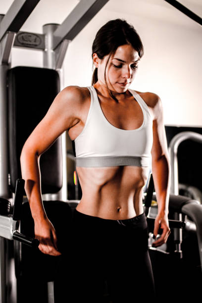 istock Woman in the gym 1162556383
