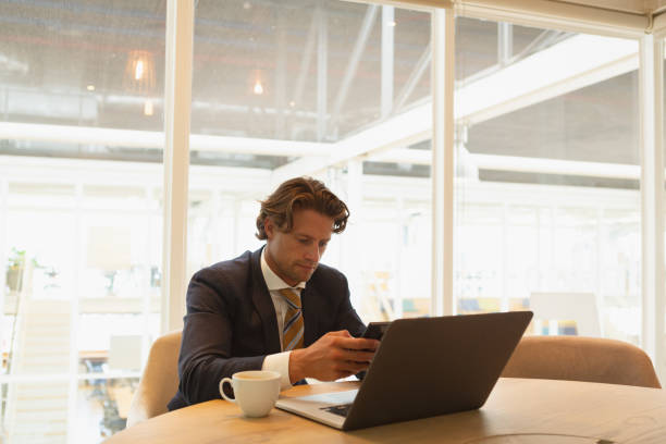 istock Businessman using mobile phone in the conference room 1162558519