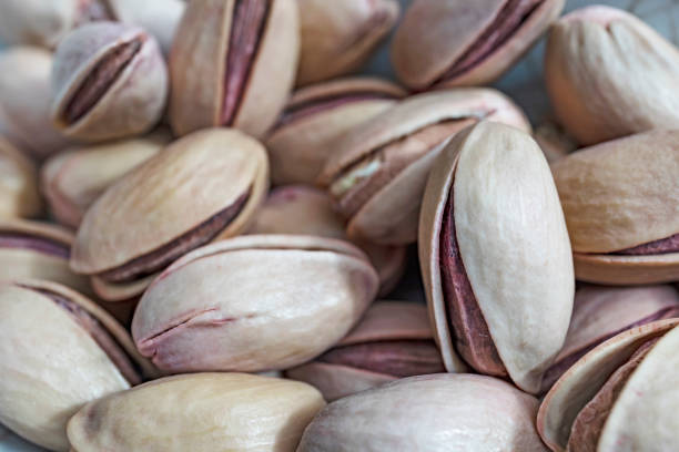 istock close up shelled pistachios in white plate 1162558664