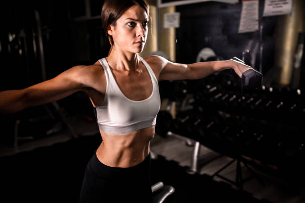 istock Woman in the gym 1162559632