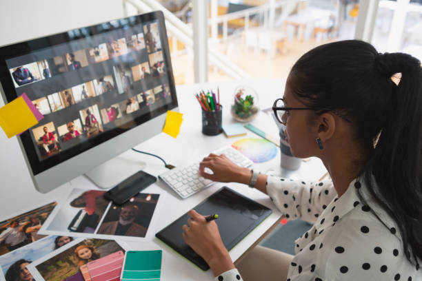 istock Female graphic designer working on computer at desk 1162567790