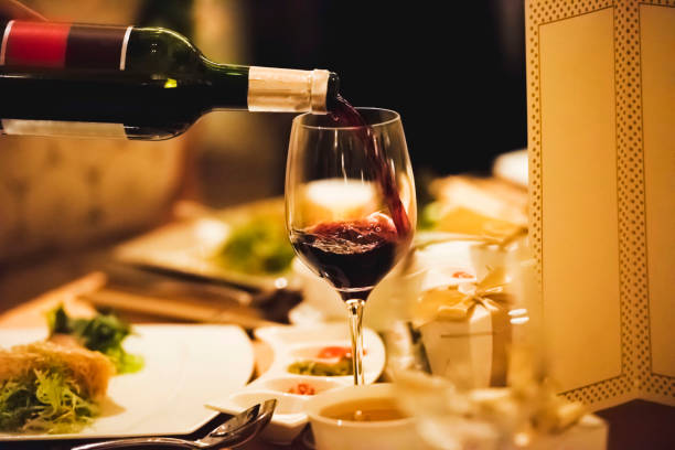 istock Waiter pouring wine inside the glass 1162569220
