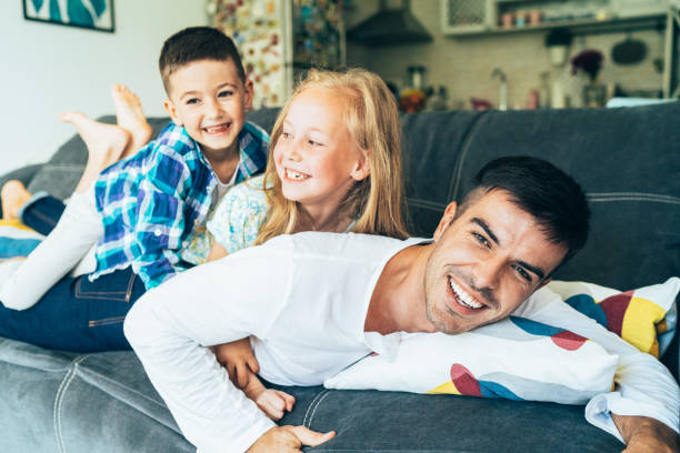 istock Father and children's time 1162570994