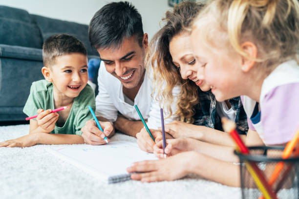 istock Young family drawing 1162570996