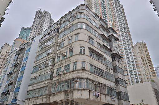 The term tong lau or qi lou is used to describe tenement buildings built in late 19th century to the 1960s in Hong Kong
