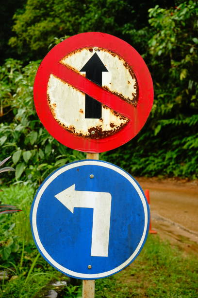 istock Turn Left Ahead in Brunei and Don't go straight 1162577860