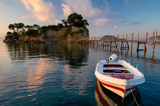 Boat and Agios Sostis Island, Zakynthos, Greece
