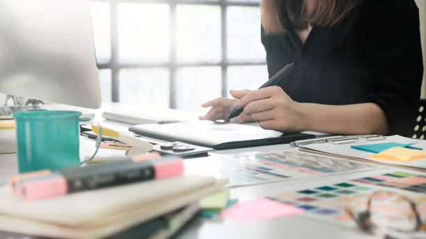 istock Closeup woman working with sketch on digital table, Graphic designer working on table. 1162582924