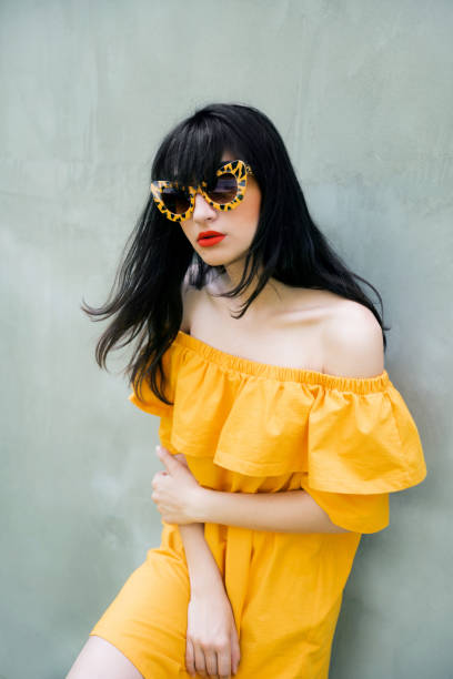 istock Woman in yellow dress 1162582965
