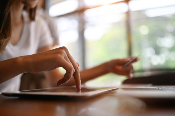 istock Shopping online with woman using digital tablet. 1162583212