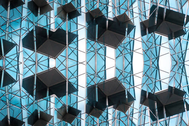 istock underside panoramic and perspective view to steel blue glass high rise building skyscrapers, business concept of successful industrial architecture 1162585001