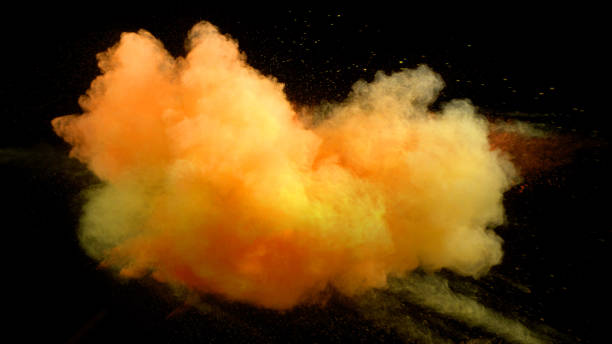 istock Collision of colored powder isolated on black 1162585745