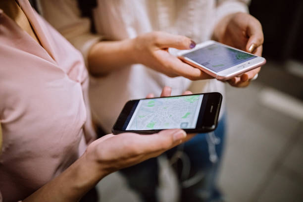 istock Young girls using phone on their way to school 1162591274