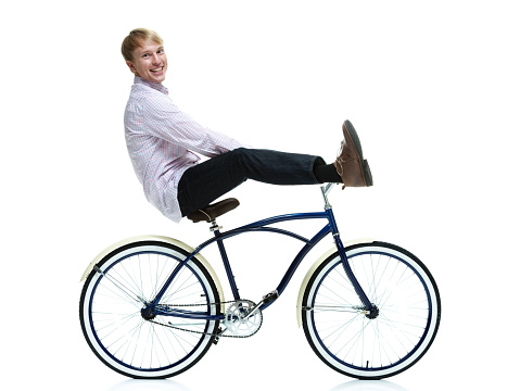 Handsome man riding a bicycle