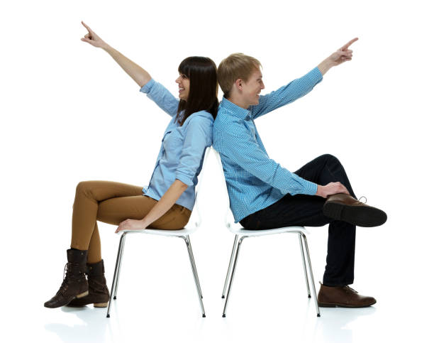 istock Beautiful couple sitting next to each other 1162591673