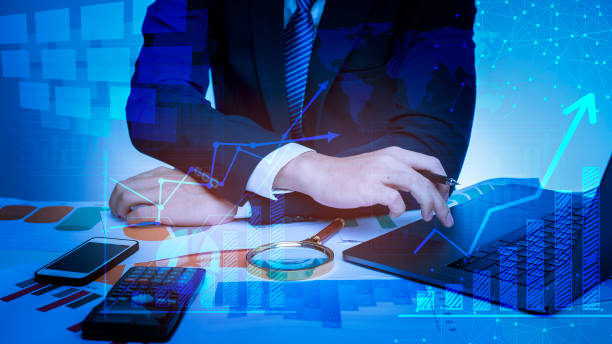istock close up of businessman is analyzing data in office 1162595121