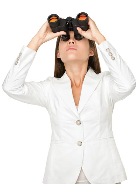 istock Young Businesswoman Looking Through Binoculars 1162595144