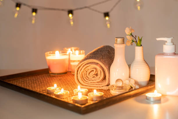 istock Beauty spa treatment with candles, Massage background 1162596312