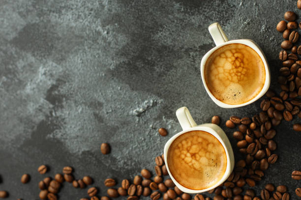 istock coffee freshly brewed in a white cup serving of beverage (coffee grain). food. top. copy space 1162598376