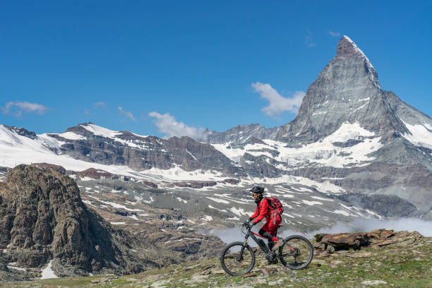 istock mountain biking in Zermatt, Switzerland 1162598764