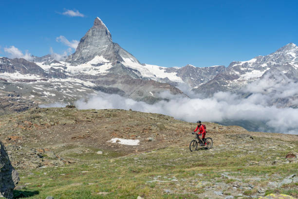 istock mountain biking in Zermatt, Switzerland 1162598912