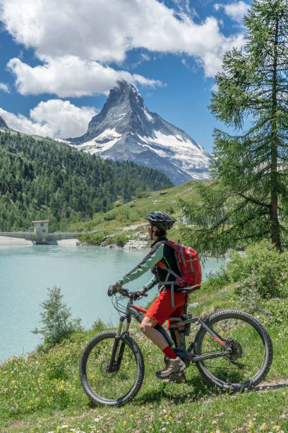 istock mountain biking in Zermatt, Switzerland 1162598917