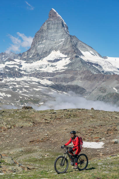 istock mountain biking in Zermatt, Switzerland 1162599527