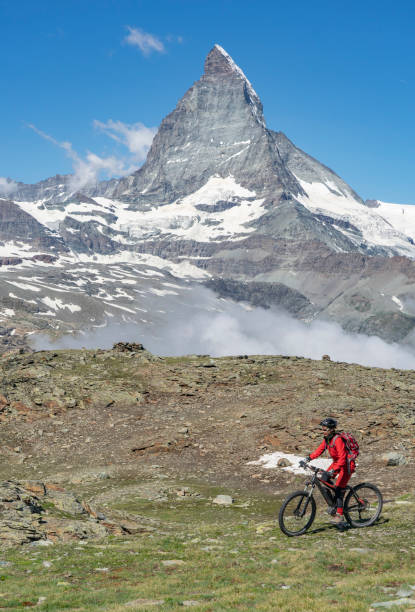 istock mountain biking in Zermatt, Switzerland 1162599716