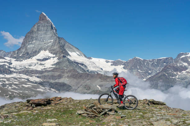 istock mountain biking in Zermatt, Switzerland 1162599810